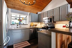 New stainless steel appliances in this updated kitchen that has it all.