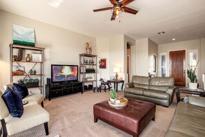 Living room with large flat-screen tv.