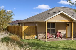 Private home on quiet street with beautiful front yard and fully fenced back yard.