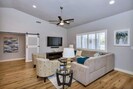Our living room is cozy, yet has enough space to bring over chairs and snacks to watch the big game.