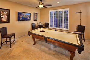 Fun game room with pool table.