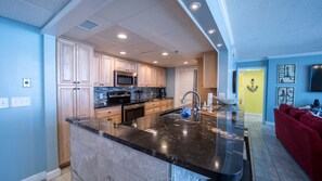 Recessed lighting above kitchen bar 