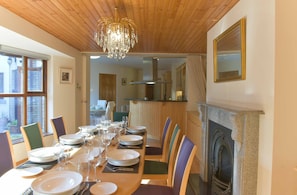 The Dining Room with the Kitchen in the background