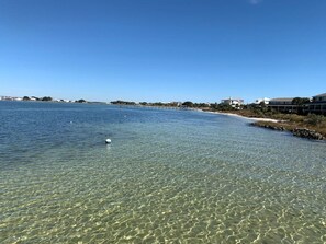 Crystal clear water of the sound. Two minute walk from the condo. Perfect for children and paddleboarding.