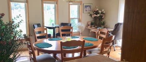 Large dining room with windows to view wildlife