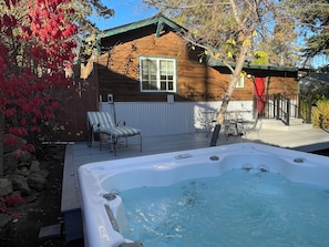 Beautiful, private backyard area with deck, gazebo, hot tub, and plenty of lawn
