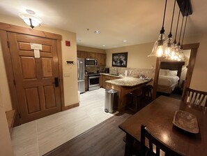 Kitchen with new porcelain tile installed in November, 2023.