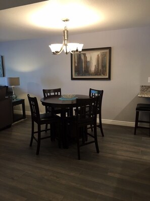 Dining room table (expansion leaf not shown). Seats up to 6 people.