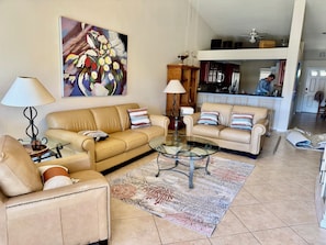 Family Room w Vaulted Ceilings views of Lake and Fountain