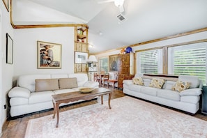 Livingroom abuts kitchen and cozy breakfast table.