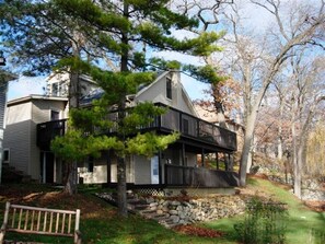 View from the lake- two large wrap around porches on Main and Lower levels