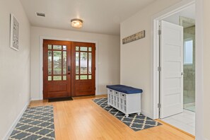 Front entry way & guest bathroom on main floor