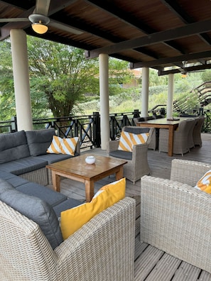 Comfortable lounge set in a tropical garden with plenty of privacy.
