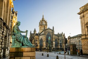 The Royal Mile is at the heart of Edinburgh's Old Town, with Edinburgh Castle at its head and the Palace of Holyroodhouse at its foot. 
