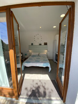 French doors leading onto large terrace. 