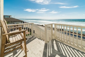 Oceanfront Villa located directly on the Oceanside Strand (one-way 15 MPH beachfront road frequented by pedestrians, hot rods, dog-walkers and more)
