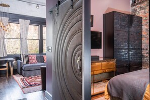 Soft lighting and warm textures create a serene retreat for a good night's sleep.