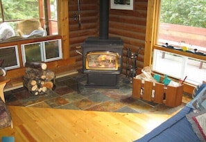 Woodstove in the corner of the great room.