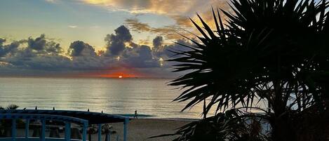 Sunrise from the condo balcony.  
Every morning is a delight with sunrise