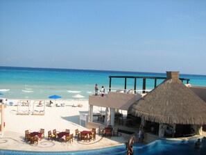 Beach; swim up bar; sun deck above restaurant balcony view C226