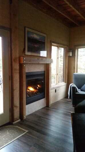 gas fireplace / timber framed hearth