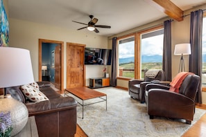 Living room with 65" flat screen TV