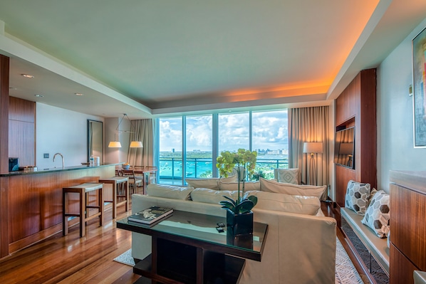 Living room with unobstructed views of the ocean, intra coastal  and channel.