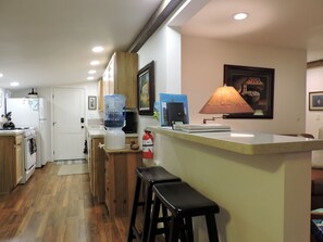 Kitchen and Bar with New Lighting, Countertops & Flooring!