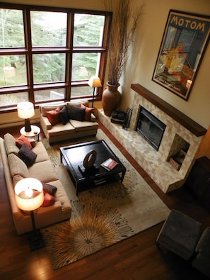 Living room overhead2 - Snuggle up next to the wood-burning fireplace.