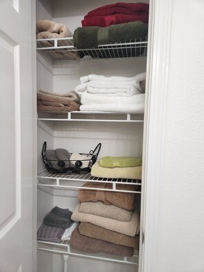 Master bath closet with plenty of Towels.
