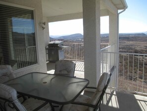 balcony dining table and gas bbque