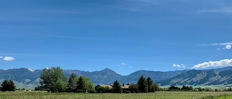 Privately positioned on 10 acres with exceptional views of the Bridger Mountains