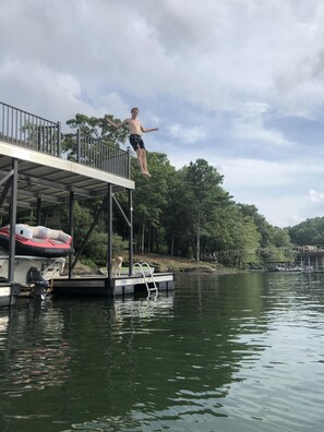 Jumping off the top level of our dock - 12.5 feet into 50+ feet of lake water!