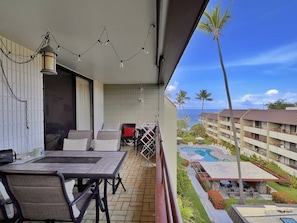 Lanai with ocean and pool view.
