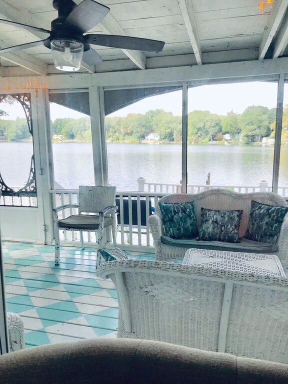 view from screened in porch of lake in wrentham, MA