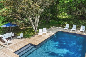 Vibrant poolside with lounge chairs