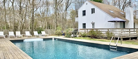 Beautiful home w/ 18x36 ft heated pool, 2 sundecks, & spacious, private grounds