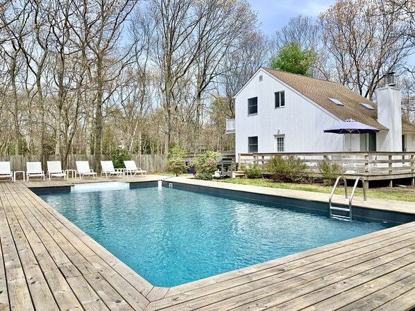 Beautiful home w/ 18x36 ft heated pool, 2 sundecks, & spacious, private grounds