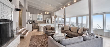 Living room with view to kitchen