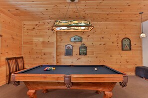 Pool table in basement game room