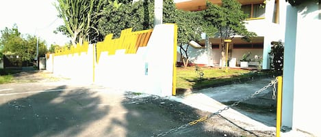 Main entrance and private road of  villa's California