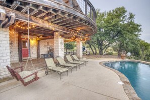 Sit on the deck overlooking pool area and hills