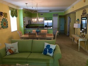 Dining area with seating for 6 at dining table and 4 at breakfast bar