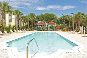 Summer pool at Legacy Dunes.  Lots of sun loungers!  So close to our condo!