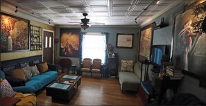 Living Room-Comfortable and eclectic, 2 couches, recliner, TV, DVD's, games.