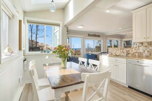 Dining and kitchen area adorned with natural lights