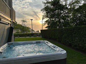 Hot tub with the beauty of  sunset