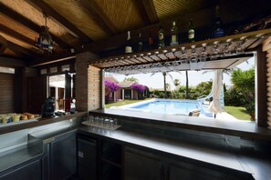 Outside bar overlooking  the pool.
