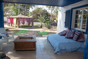 Back terrace with comfy sofa and plenty of seating