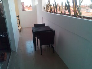 porch area leading to villa apartment